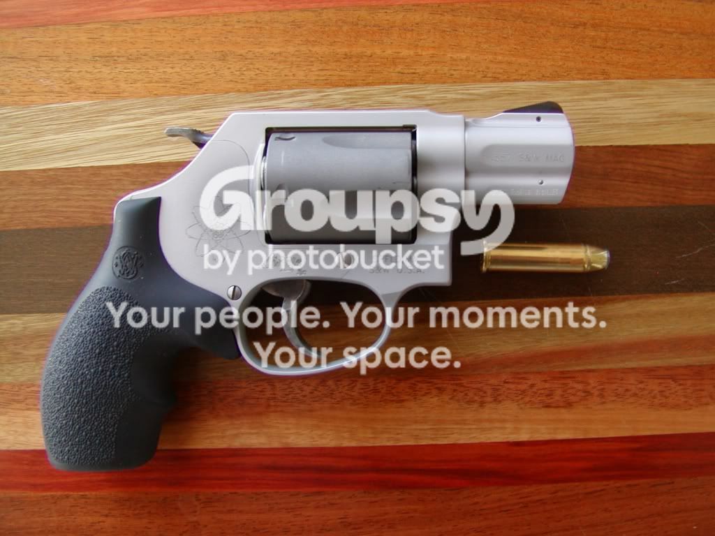 http://i490.photobucket.com/albums/rr268/fivefivesix556/SW360-357Mag.jpg